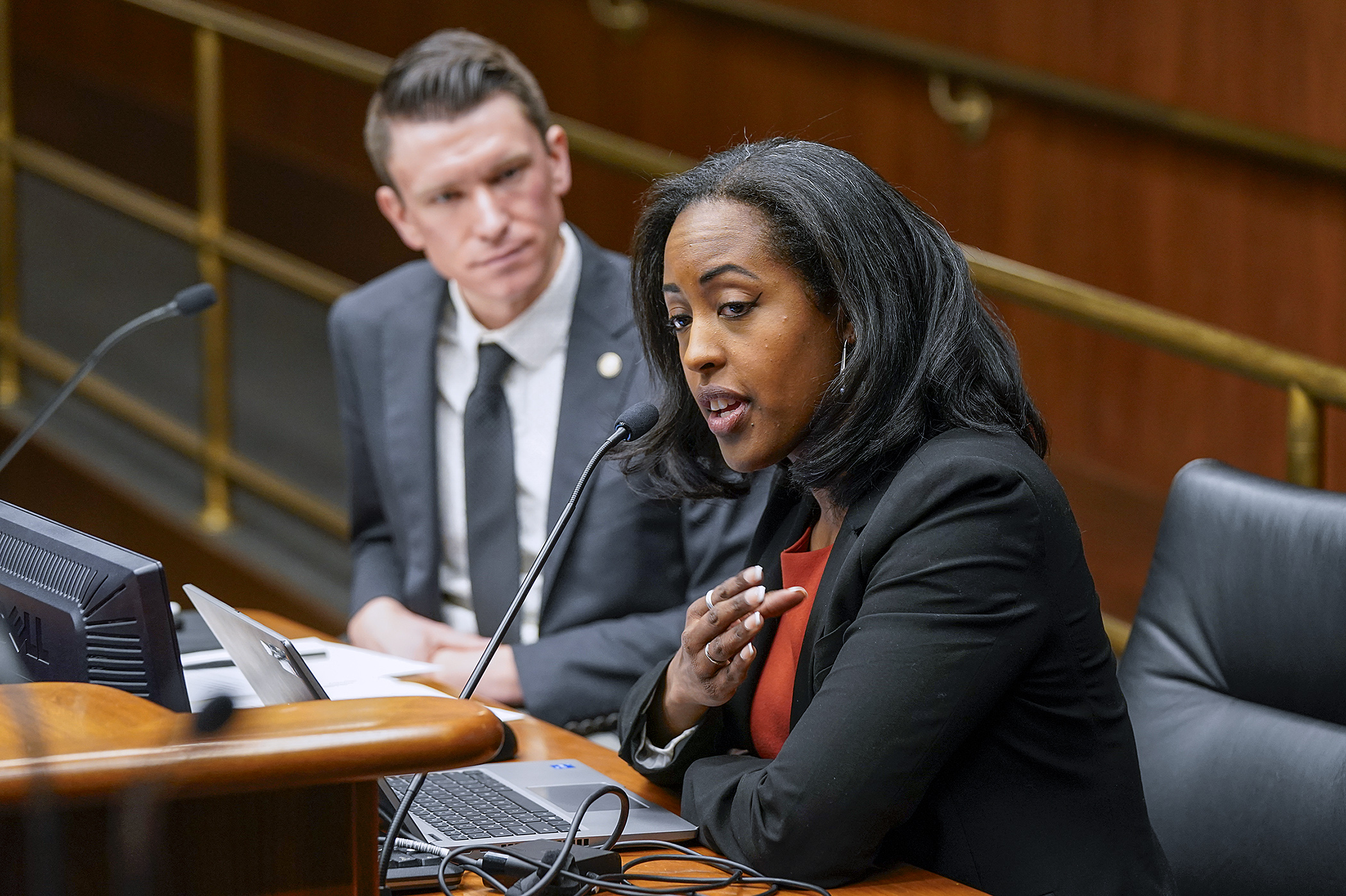 Yelena Bailey, executive director of the Minnesota Professional Educators Licensing and Standards Board, testifies March 21 before the House Education Finance Committee on a bill to establish a system to pay student teachers. (Photo by Michele Jokinen)